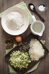 Ingredients for making zucchini muffins on table - EVGF000007