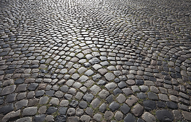 Germany, Cologne, Cobblestone street - GWF002117