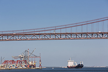 Portugal, Lisbon, View of 25 de Abril Bridge at River Tagus - FOF004712