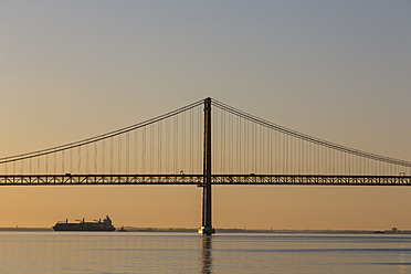 Portugal, Lisbon, View of 25 de Abril Bridge at River Tagus - FOF004722