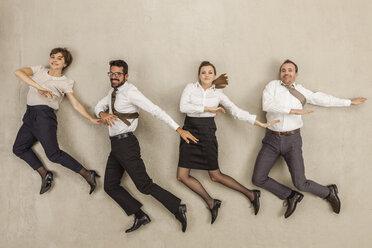 Business people dancing in office - BAEF000549