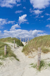 England, Sussex, Chichester, Way through sand dune on beach at West Wittering - WDF001516