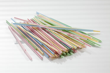 Variety of drinking straws on white background, close up - CSF016648