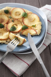 Apple and oat flakes pancake with fork and knife - EVGF000055
