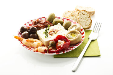 Various antipasti filled with soft cheese on plate, close up - MAEF005911