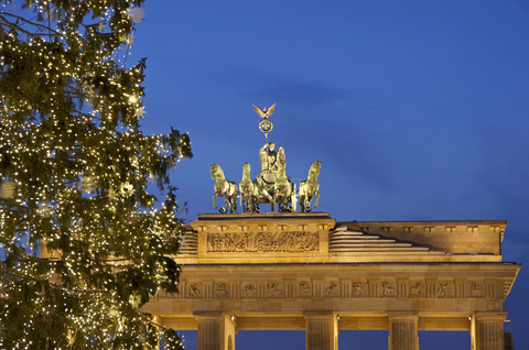 Germany, Berlin, View of Brandenburger Tor with Quadriga and christmas tree stock photo