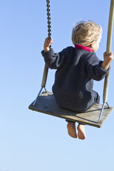 Germany, Kiel, Girl on swing - JFEF000020