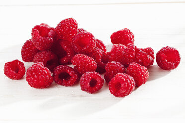 Raspberries on white background, close up - CSF017449