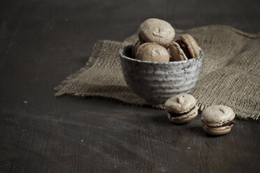 French Macarons filled with chocolate ganache in bowl - SBD000004