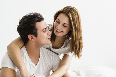 Young couple embracing each other, smiling stock photo