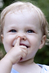 Germany, Girl picking her nose, close up - JFEF000058