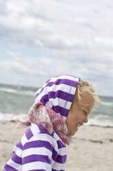 Denmark, Girl at beach, smiling - JFEF000071