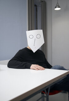 Man covering face with mask - TKF000056