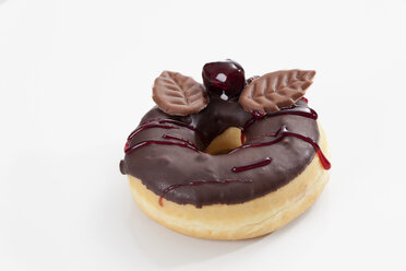 Doughnut topped with chocolate icing, close up - CSF017882