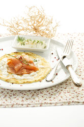 Plate of pancake with smoked salmon, horseradish and dill, close up - MAEF006223