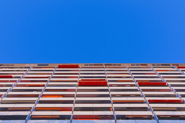 Germany, Baden Wuerttemberg, Low angle view of high rise apartment building with balconies - WDF001655