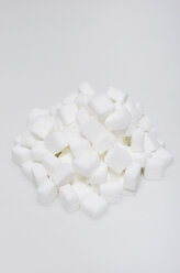 Sugar cubes on white background - MUF001307