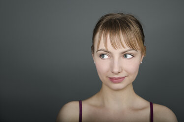 Young woman smiling, close up - ONF000075