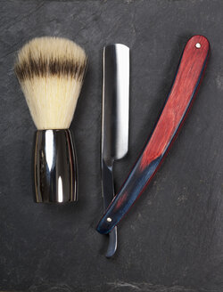 Shaving brush and razor on slate board, close up - TDF000041