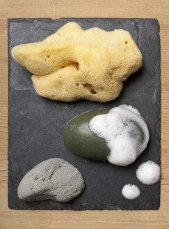 Soap, sponge and stone on slate board, close up - TDF000036