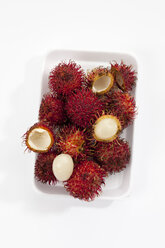 Rambutan-Früchte auf Tablett - CSF018579