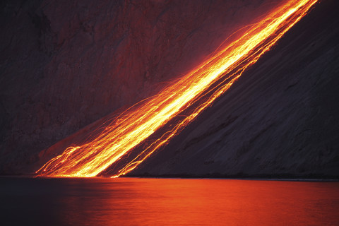 Indonesia, View of lava from Batu Tara volcano island stock photo