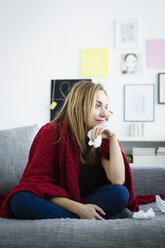 Germany, Bavaria, Munich, Young woman looking away, smiling - SPOF000355