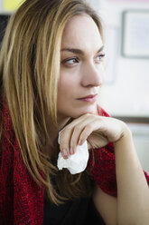 Germany, Bavaria, Munich, Young woman looking away, close up - SPOF000330