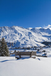 Switzerland, View of bench in snow - WDF001733