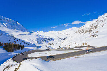 Switzerland,Cars passing through winding road - WDF001714