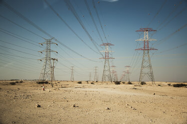 Qatar, Doha, Power poles in desert - FB000037