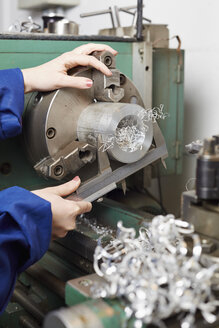 Germany, Kaufbeuren, Woman working in manufacturing industry - DSC000077