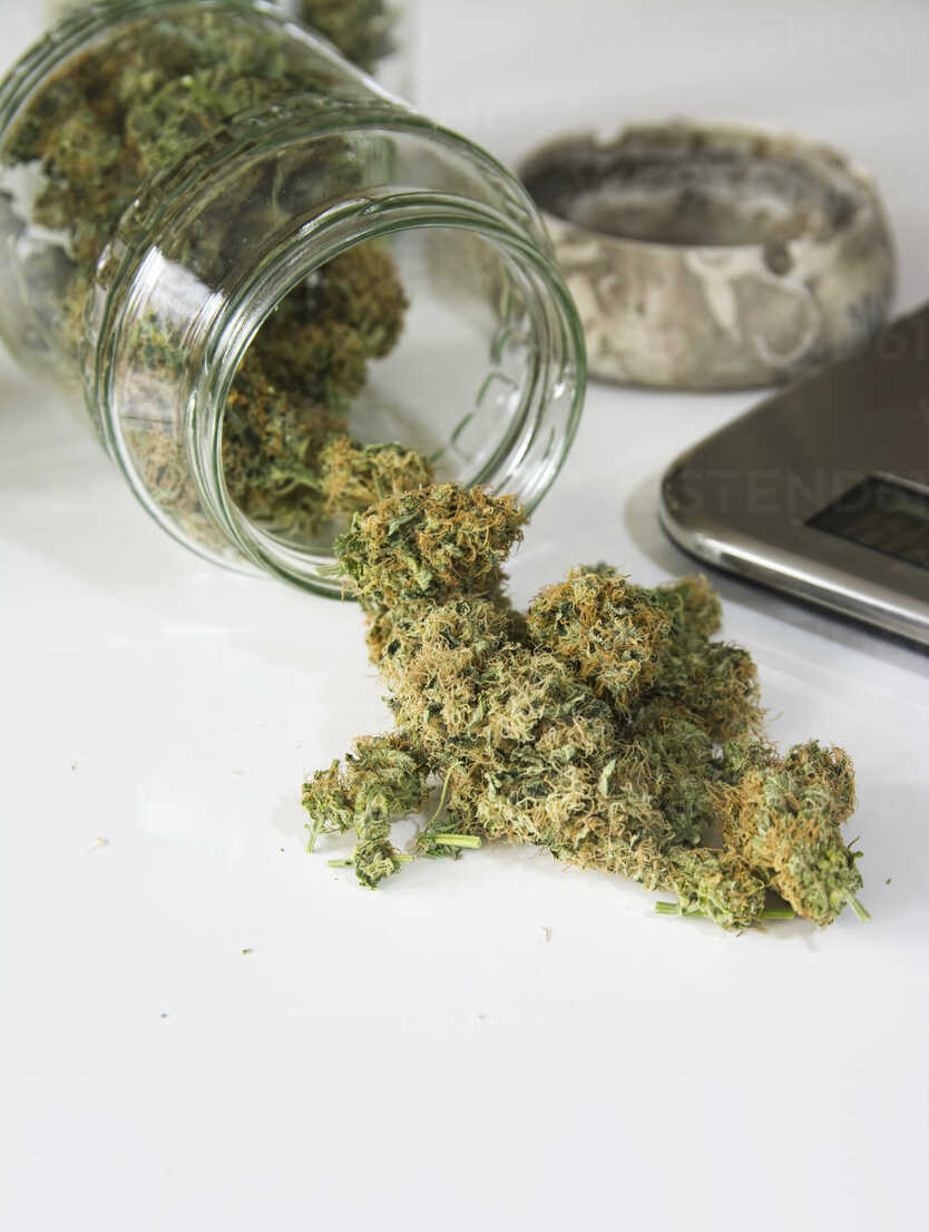 Studio, Marijuana drugs on digital scale, close up stock photo