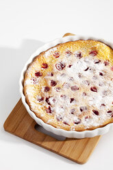 Cherry cake on chopping board, close up - CSF019107