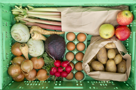 Variety of vegetables in crate, close up stock photo