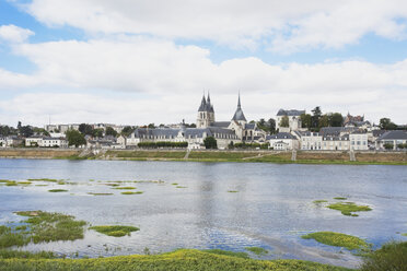 France, Blois, View of Saint Nicholas church and Royal castle with river Loire - GWF002211