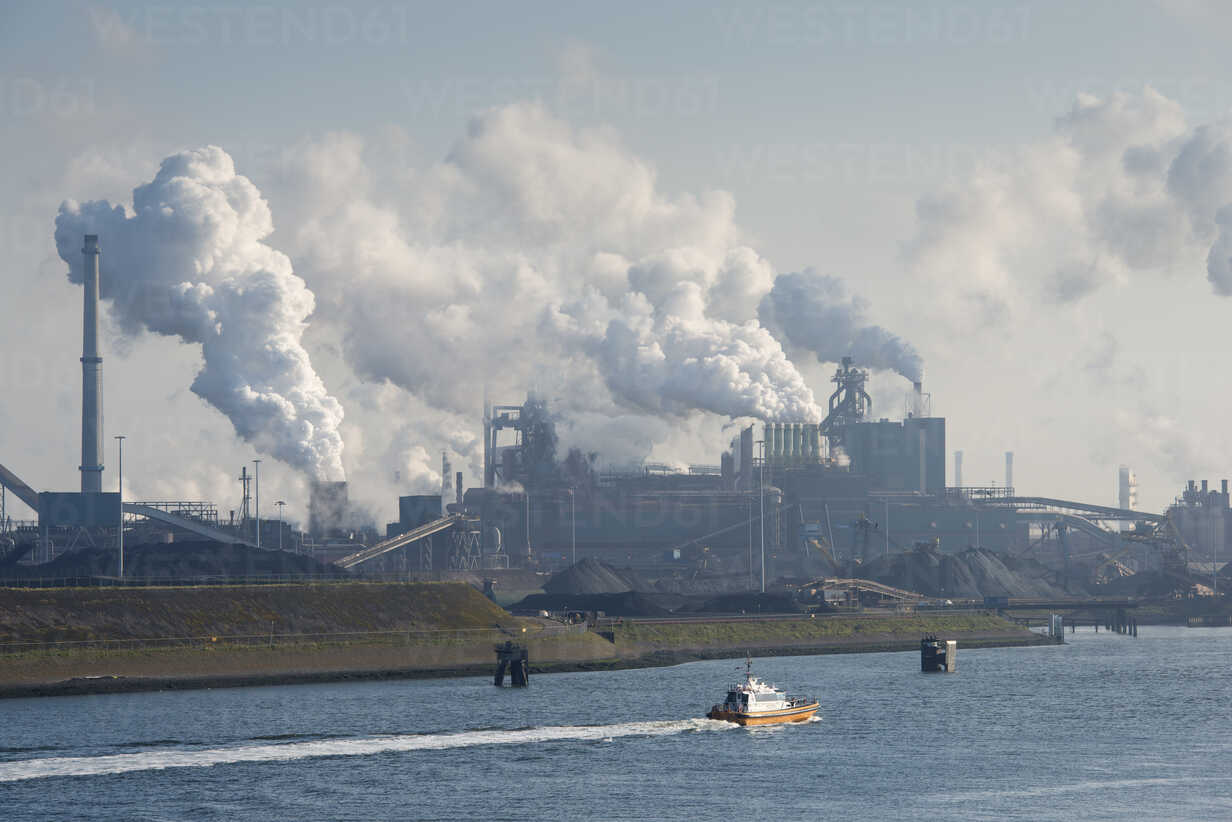 Netherlands, Amsterdam, View of Tata steel plant on North Sea coast stock  photo