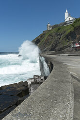 Spain, View of Lighthouse near beach - LA000082