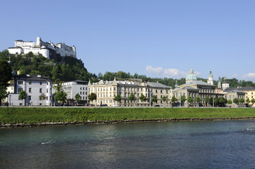 Austria, Salzburg, View of Hohensalzburg Castle and University near Salzach River - LH000160