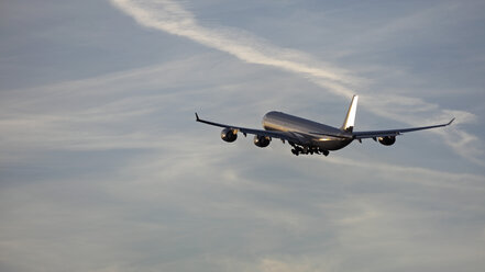 Germany, Bavaria, Munich, View of airbus a 340-600 departing at sunset - RDF001103