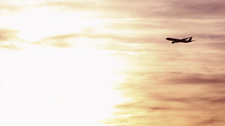 Germany, Bavaria, Munich, View of airbus a 340-600 departing at sunset - RDF001105