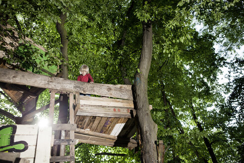 Germany, North Rhine Westphalia, Cologne, Boy playing in playground - FMKYF000418