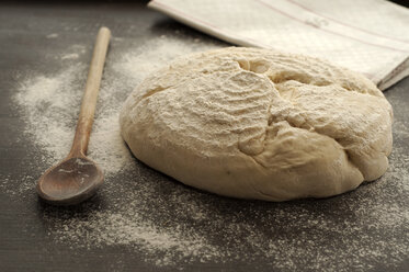 White bread with wooden spoon on table, close up - OD000098