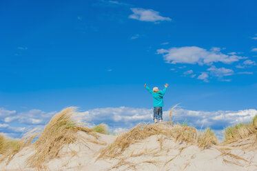 Denmark, Romo, Boy standing at North Sea - MJF000232