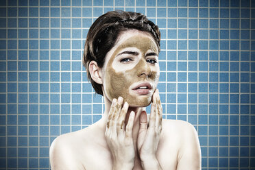 Portrait of young woman with medicinal clay mask, close up - SPO000453