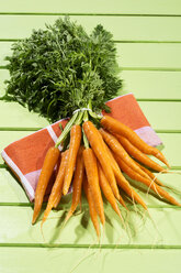 Bunch of carrots on napkin, close up - MAEF006862