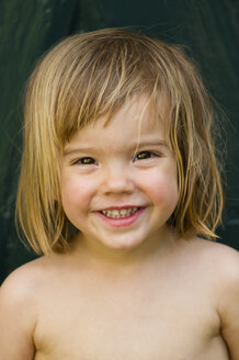 Germany, Baden Wuerttemberg, Portrait of girl smiling, close up - LVF000129