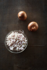 Chopped onions in bowl - EVG000134