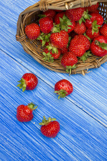 Basket of strawberries on wooden table, close up - LVF000145