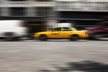 USA , New York, View of yellow taxi in motion - SKF001422